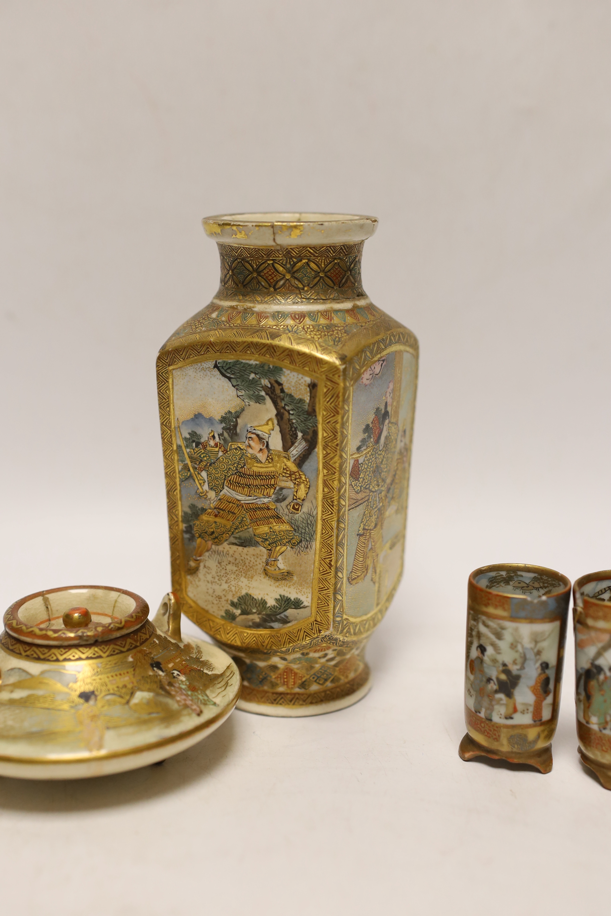A Japanese Satsuma teapot and three vases, tallest, 15cm high